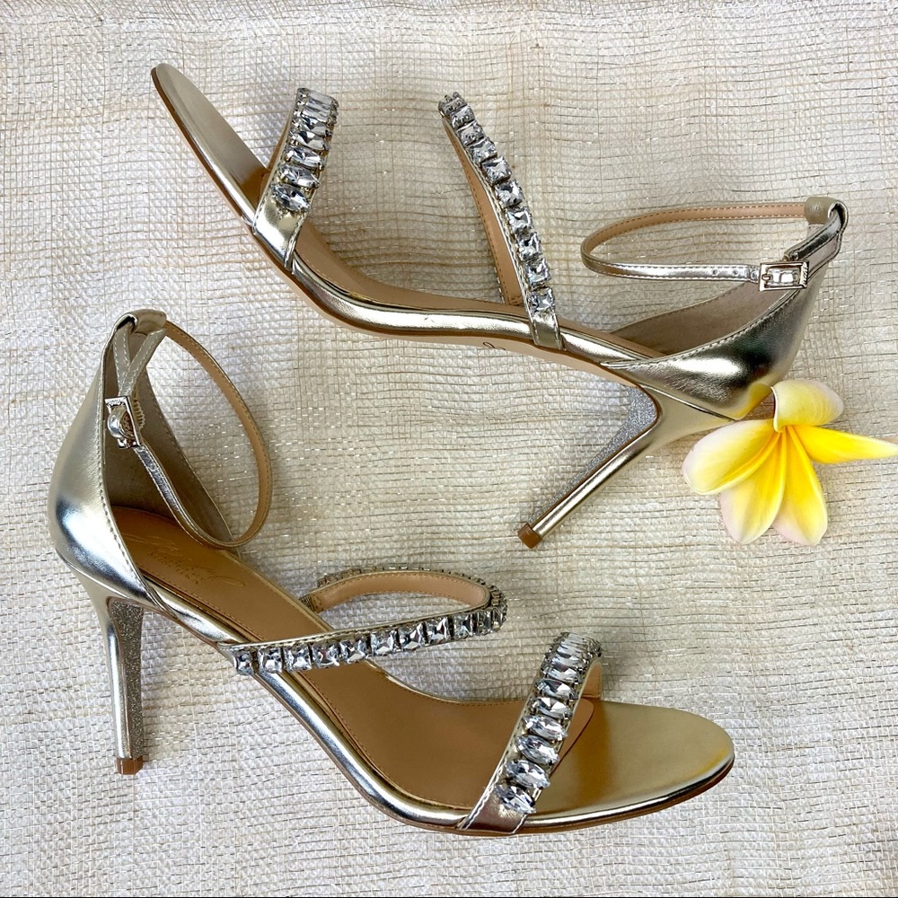 JEWEL BADGLEY MISCHKA Gold Metallic Sandals with Rhinestone Embellishment.